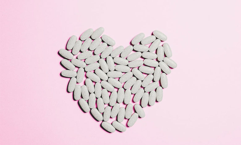 Collection of women's multivitamins in the shape of a heart